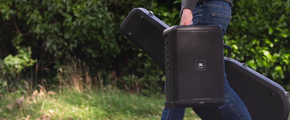 JBL-EON ONE Compact being carried by a musician