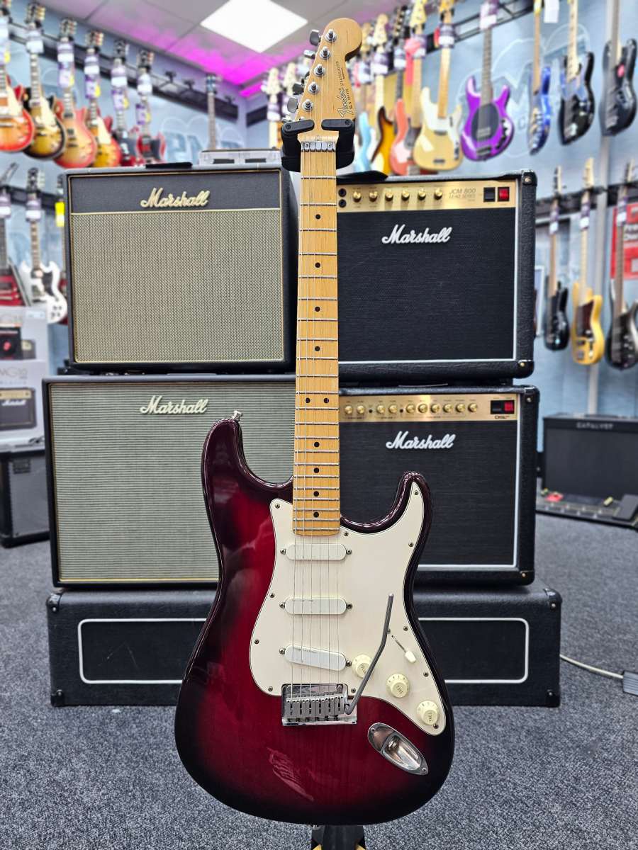 An image of Pre-Owned Fender Stratocaster Plus Deluxe, Crimson Burst | PMT Online