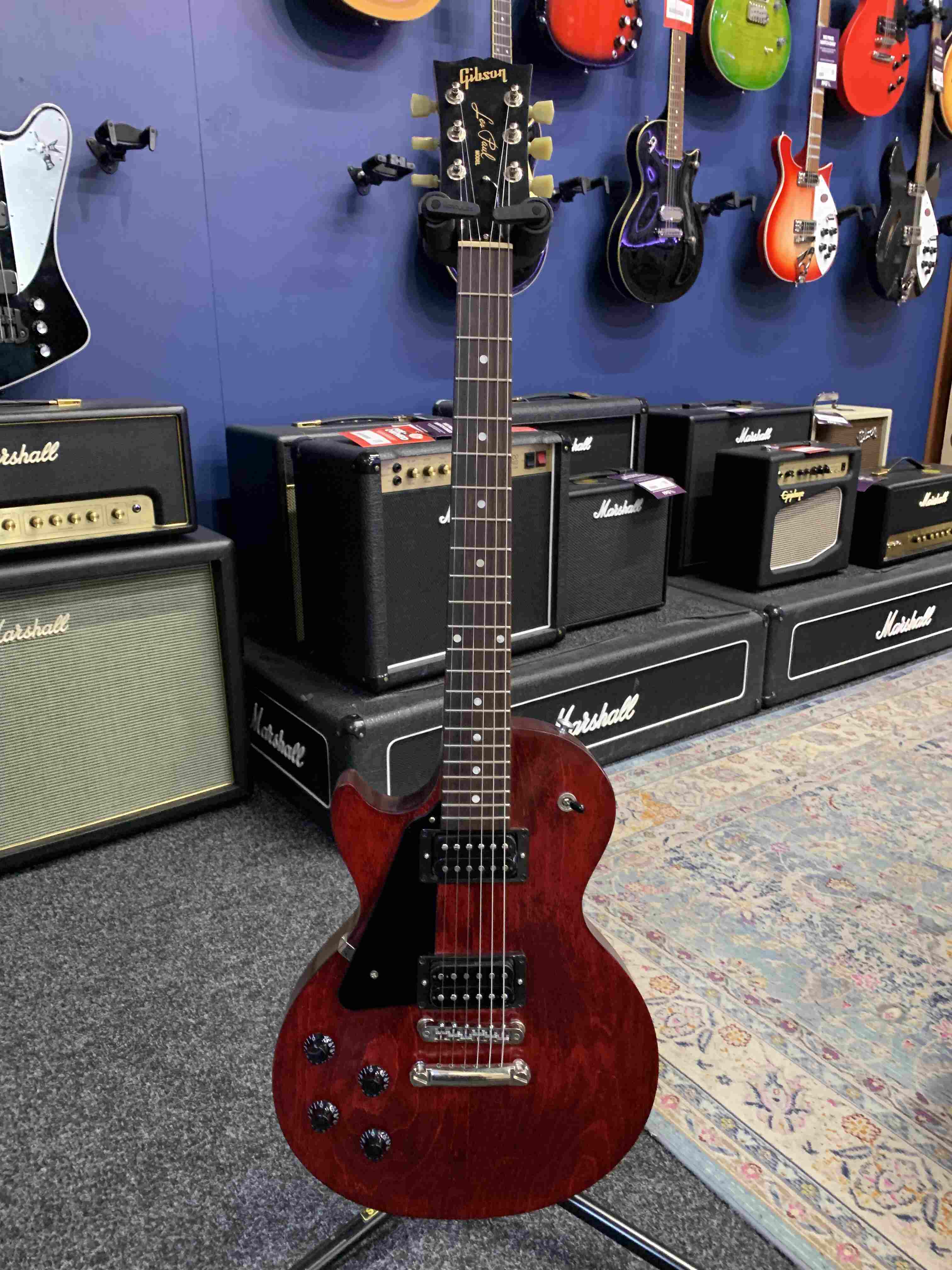 An image of Pre-Owned Gibson Studio Les Paul Wine Red Left Handed (047697) | PMT Online