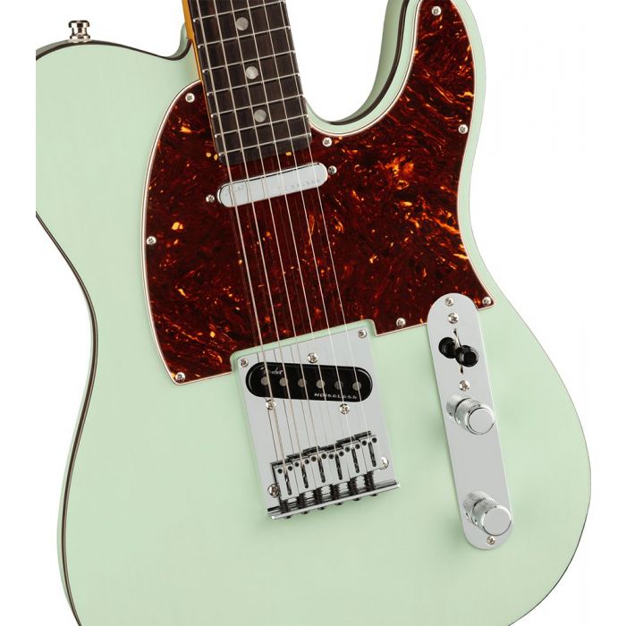 Closeup of the body on a Fender Ultra Luxe Telecaster RW, Transparent Surf Green