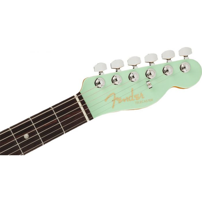 Front view of the headstock on a Fender Ultra Luxe Telecaster RW, Transparent Surf Green
