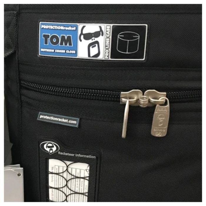 zoomed in view protection racket 12x9 tom case logo