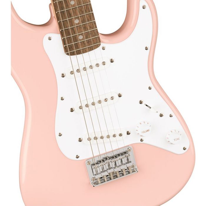 Closeup of the body on a Squier Mini Stratocaster Laurel Fb, Shell Pink