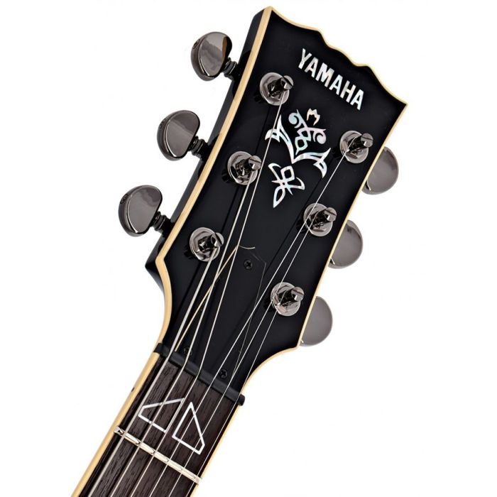 Closeup of the headstock on a Yamaha SG1820A Electric Guitar Silver Burst