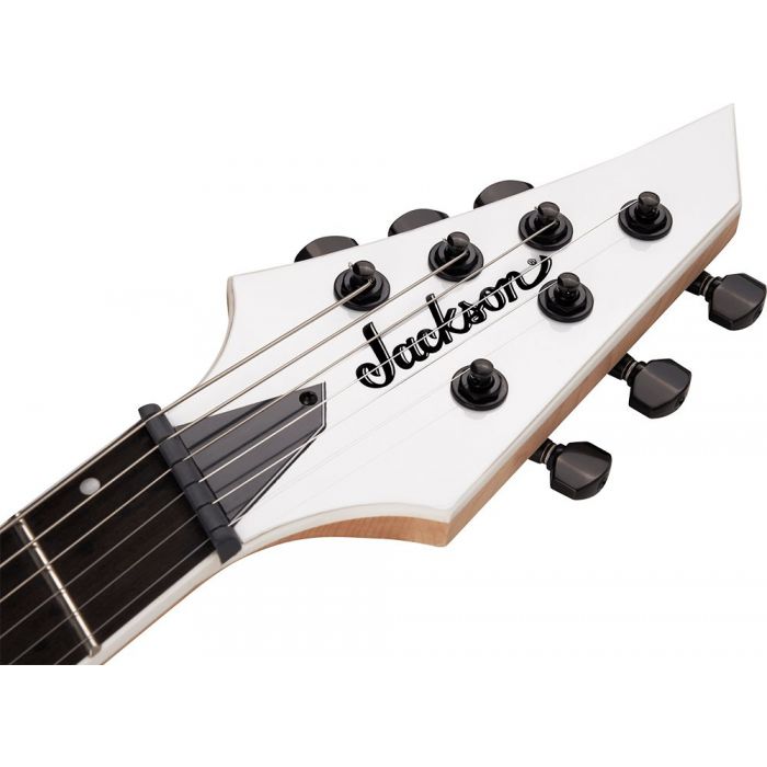 Closeup of the headstock on a Jackson Pro Series Dinky DK Modern HT6 MS, Snow White