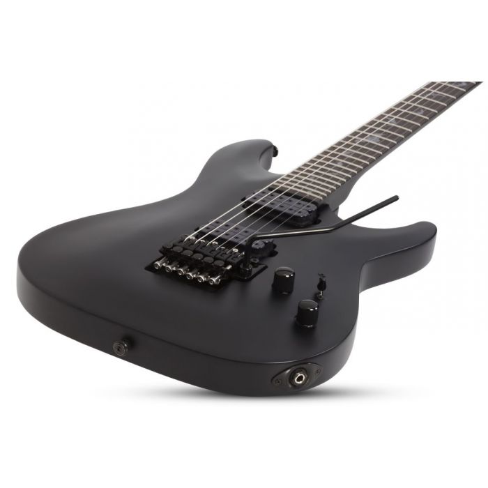 Closeup of the body on a Schecter Damien-6 FR Electric Guitar, Satin Black