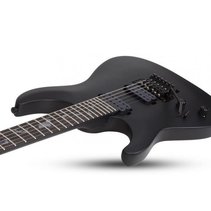 Angled view of the body on a Schecter Damien-6 FR LH Electric Guitar, Satin Black