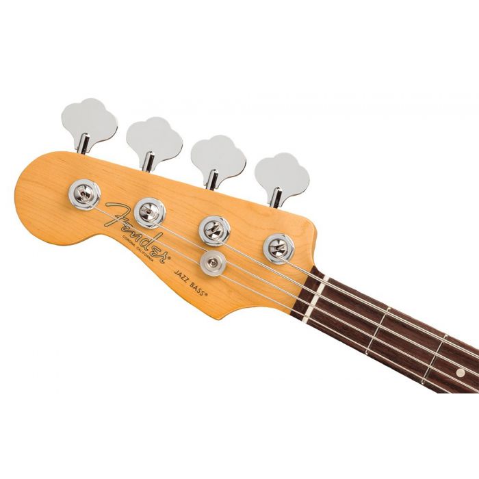 Closeup of the headstock on a Fender American Professional II Jazz Bass LH, Olympic White