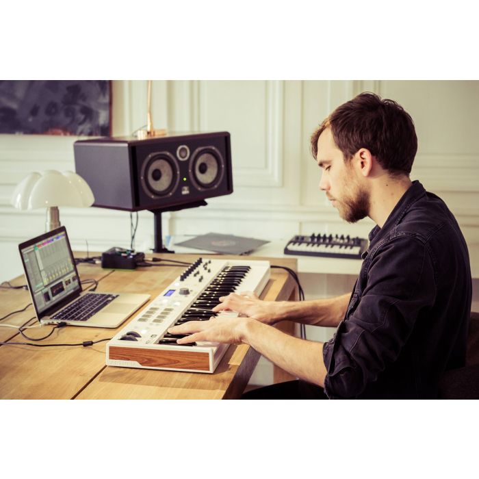 Arturia Keylab Essential 61 MIDI Keyboard in a Home Studio