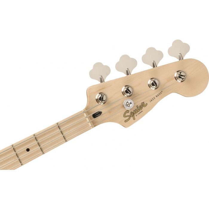 Front view of the headstock on a Squier Paranormal Jazz Bass 54 MN, White Blonde