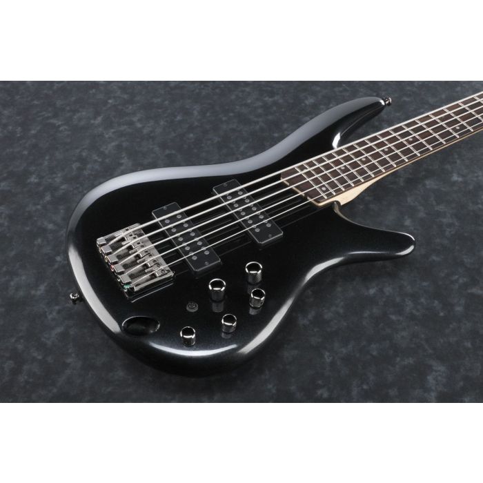 Closeup frontal view of an Iron Pewter Ibanez SR 305E 5-string bass guitar