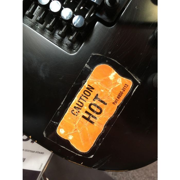 Caution Hot sticker on a ESP Kirk Hammet KH-2 Vintage Distressed Black Guitar