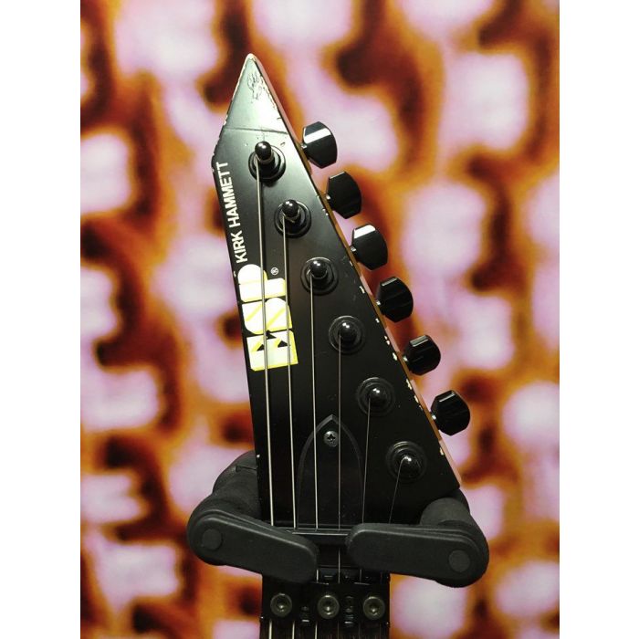 Front view of the headstock on a ESP Kirk Hammet KH-2 Vintage Distressed Black Guitar