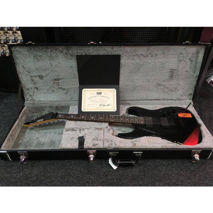 Full view of a ESP Kirk Hammet KH-2 Vintage Distressed Black Guitar in its case