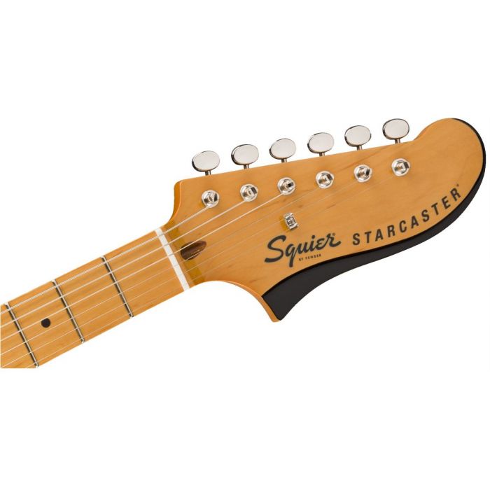 Front view of the headstock on a Squier Classic Vibe Starcaster MN Walnut