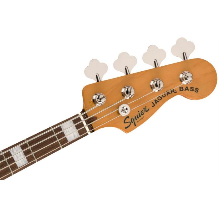 Front view of the headstock on a Squier Classic Vibe Jaguar Bass IL 3 Tone Sunburst