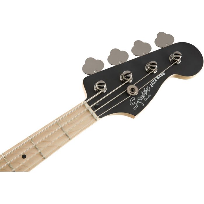 Front view of the headstock on a Squier Contemporary Active Jazz Bass HH Flat Black
