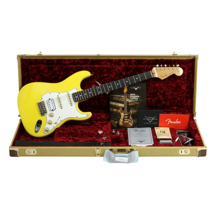 Full view of a Fender Custom Shop '52 Postmodern Strat Hss Journeyman Relic Graffiti Yellow in its open case