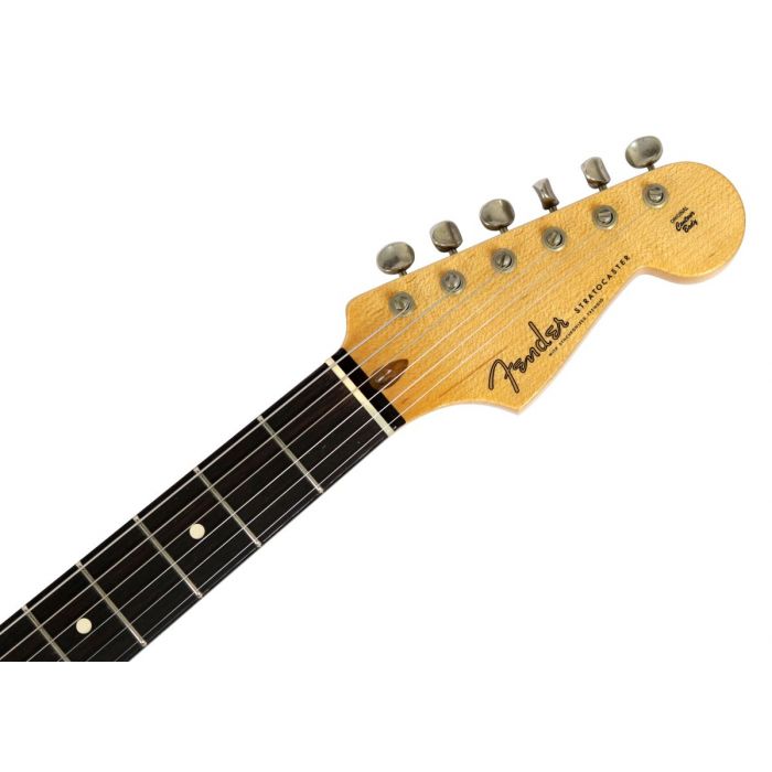 Closeup front view of the headstock on a Fender Custom Shop '52 Postmodern Strat Hss Journeyman Relic Graffiti Yellow
