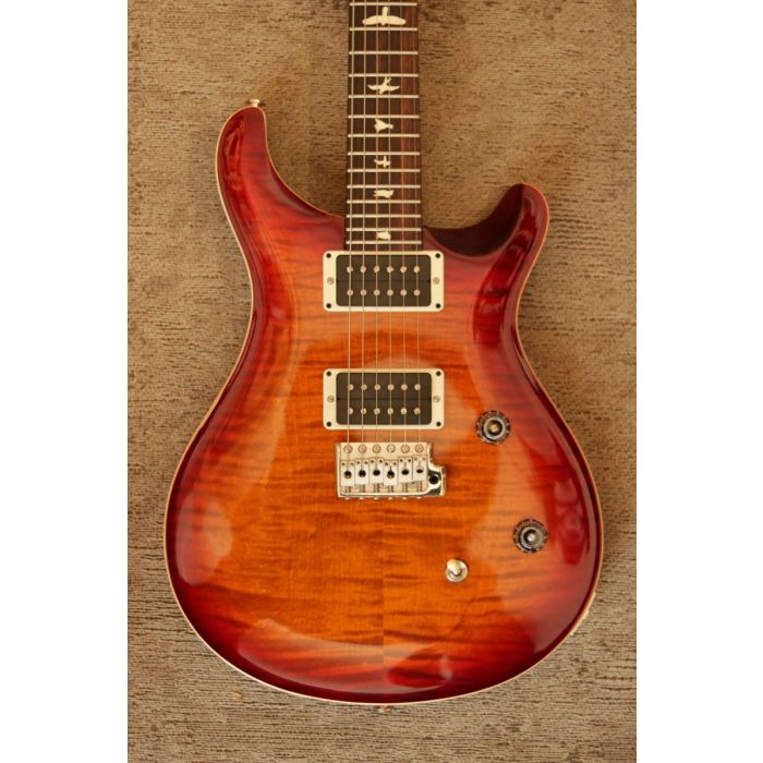 Closeup front view of the body on a PRS CE24 Dark Cherry Sunburst Flame Electric Guitar