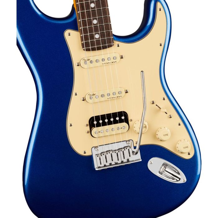 Closeup front view of a Fender American Ultra Stratocaster HSS RW Cobra Blue