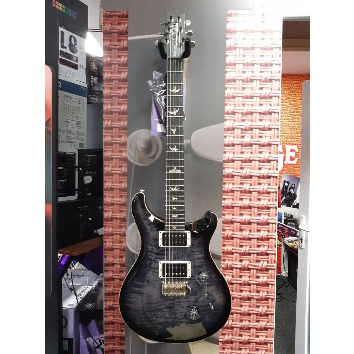 in-store photo of a limited edition PRS Custom 24 with a Purplemist finish