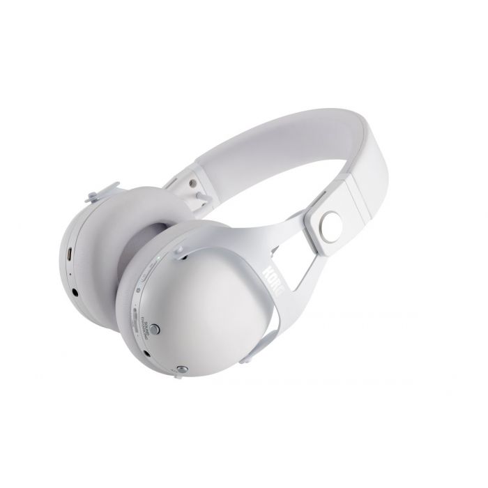 Angled view of a set of Korg NCQ1-WH Smart Noise Cancelling Headphones with a white finish