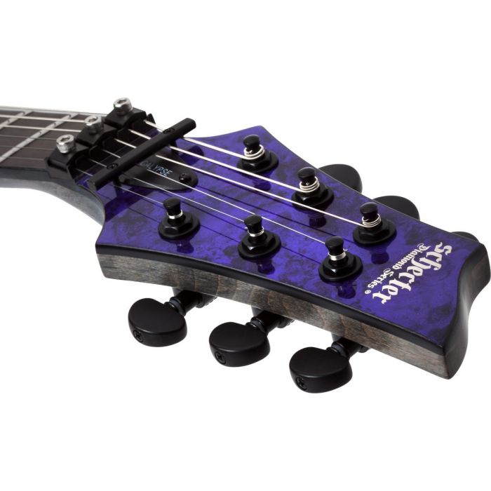 Closeup of the headstock on a Schecter C-1 FR S Apocalypse Purple Reign Guitar