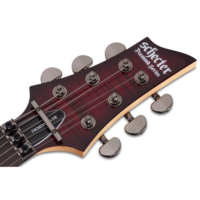 Front view of the headstock on a Schecter Demon-6 FR Electric Guitar, Crimson Red