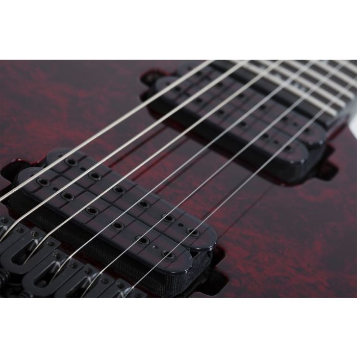 Closeup of the pickups on a Schecter PT Apocalypse Red Reign Electric Guitar