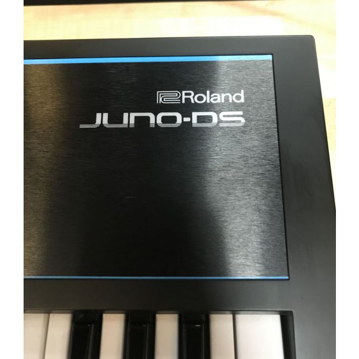 Closeup of the logo on a B Stock Roland Juno DS61 Synthesizer