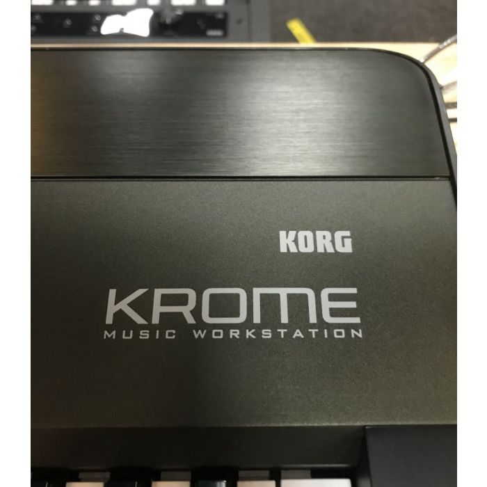 Closeup of the logo on a B-Stock Korg Krome 73 Synthesizer Workstation