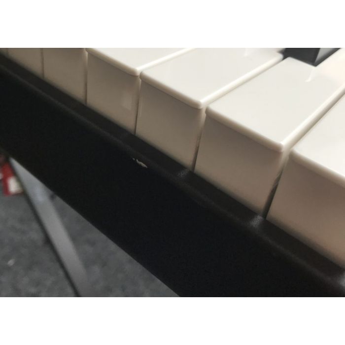 Detailed view of some damage to the front of a B Stock Nord Stage 3 88-Key Performance Keyboard