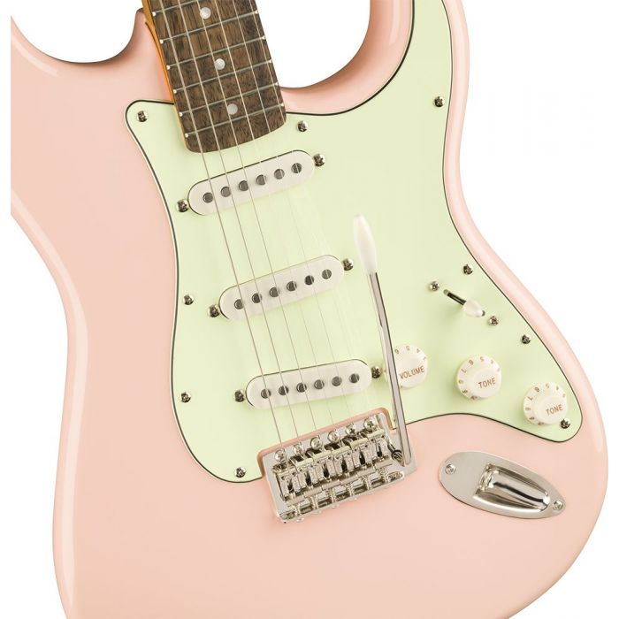 Closeup of the body on a Squier FSR Classic Vibe 60s Stratocaster Laurel Shell Pink