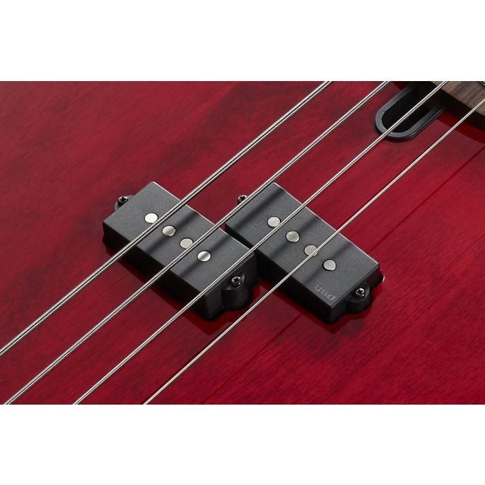 Closeup of the pickups on a Yamaha Peter Hook Signature BB Bass Guitar