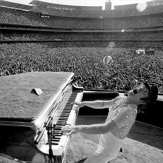 Elton John using a Shure SM57